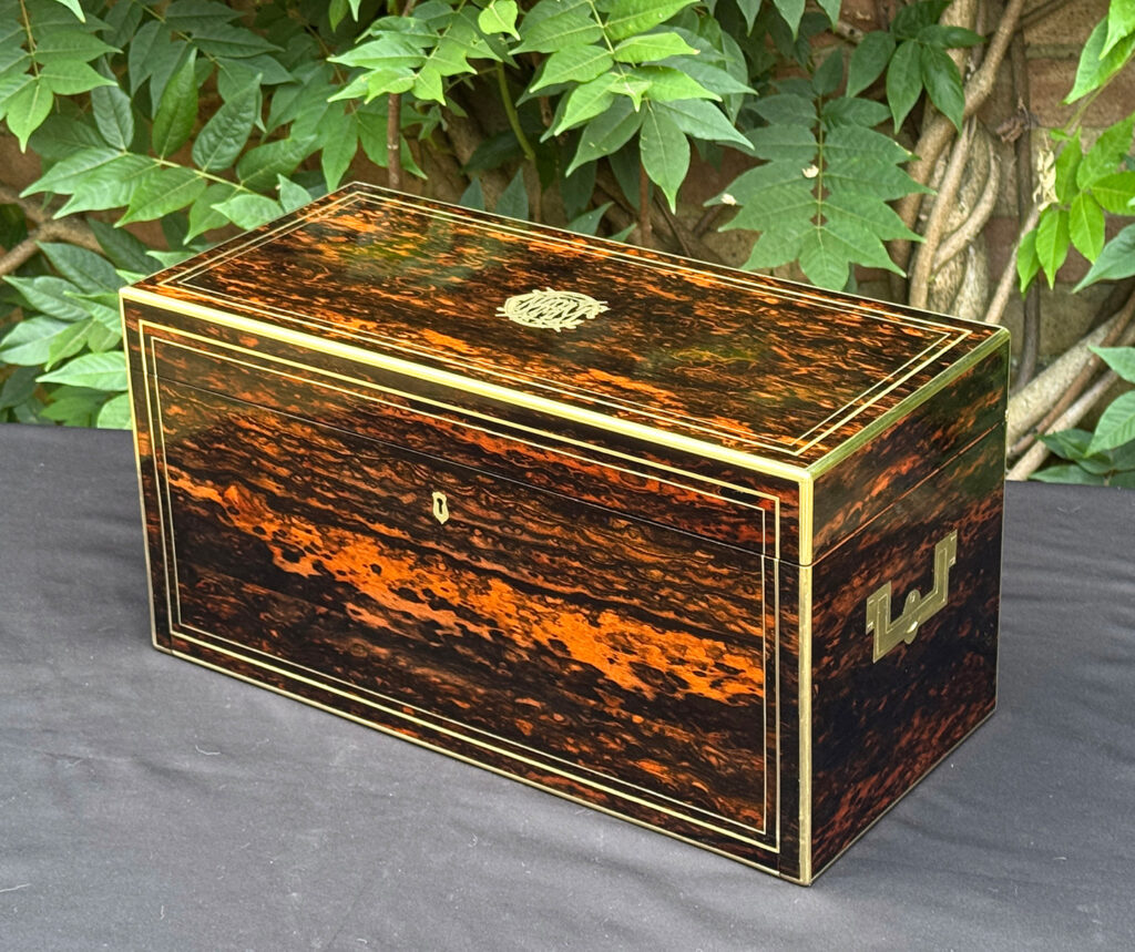 Front right view of an antique jewellery box in coromandel, by William Lund.