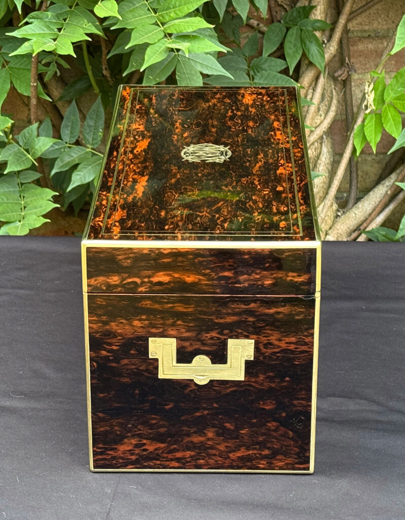 Right side view of an antique jewellery box in coromandel, by William Lund.