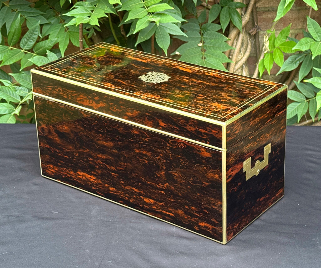 Rear left view of an antique jewellery box in coromandel, by William Lund.