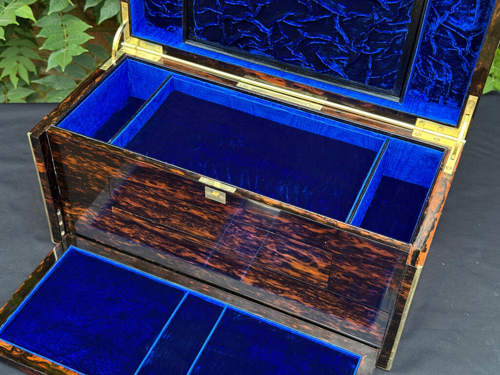 Closer interior view of an antique jewellery box in coromandel, by William Lund.